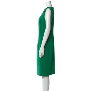 Chic Emerald Green Pleated Dress with Gold details at shoulders
